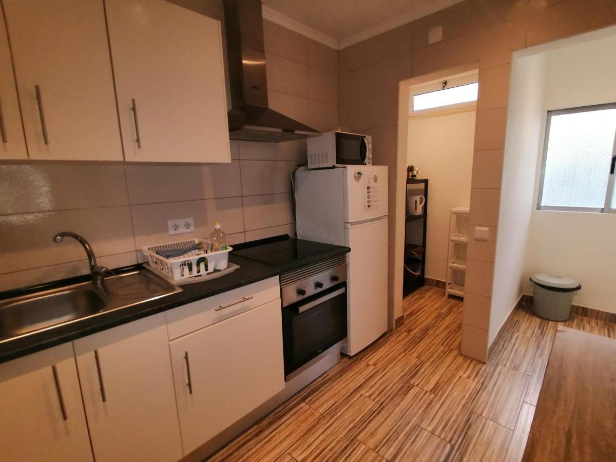 Apartamento Berlim Faro Bagian luar foto